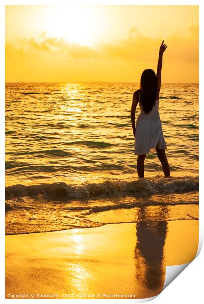 Young Asian woman enjoying ocean sunset on vacation Print by Spotmatik 