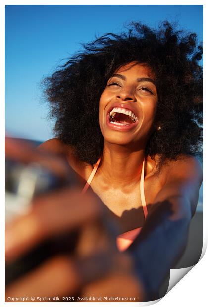 Laughing African American woman taking selfie on beach Print by Spotmatik 