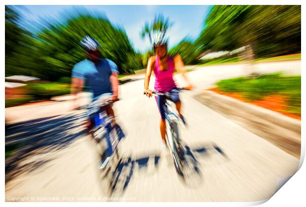 Afro American cyclists riding bikes in motion blur Print by Spotmatik 
