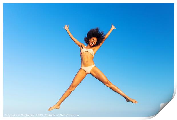 Carefree young African American woman jumping in swimwear Print by Spotmatik 