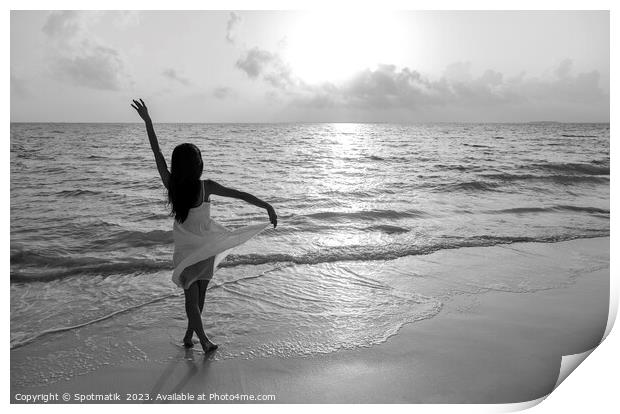 Asian girl with arms outstretched by the ocean Print by Spotmatik 