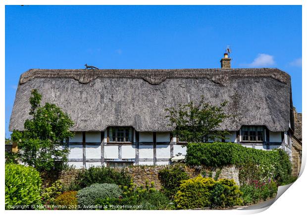 Cotswolds thatched cottage Print by Martin fenton