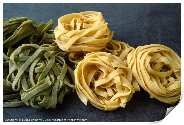 Fresh homemade green and yellow pasta tagliatelle. Raw homemade  Print by Lubos Chlubny