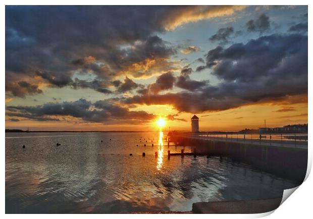 Sunset colours over Batemans Tower in Brightlingsea  Print by Tony lopez