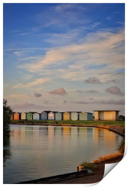 Sunrise over th beach huts around the Boating lake in Brightlingsea  Print by Tony lopez