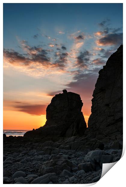 Sun Setting behind a Rock Stack Print by Kevin Howchin