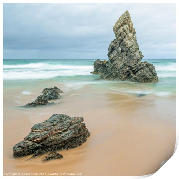 Rocks on a golden beach Print by Darrell Evans