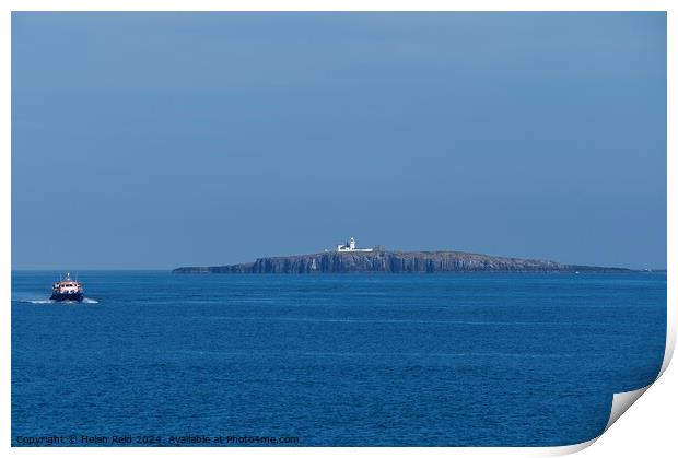 Northhumberland Farne lighthouse with a passenger boat Print by Helen Reid