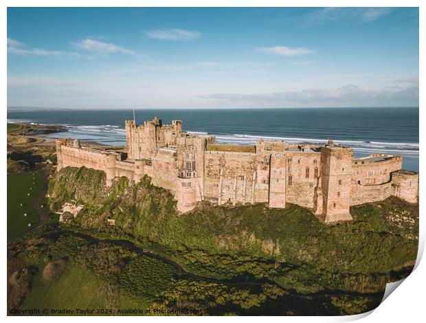 Aerial View of Bamburgh Castle, Northumberland Print by Bradley Taylor