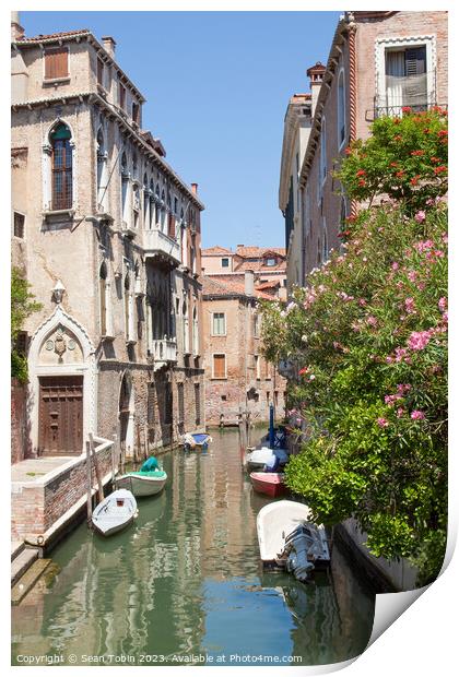 A Venice canal with boats Print by Sean Tobin