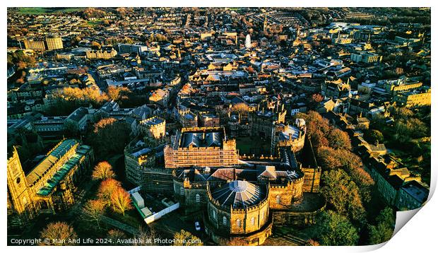 Aerial view of a historic city Lancaster at sunset with warm lighting highlighting architectural details and dense urban landscape. Print by Man And Life
