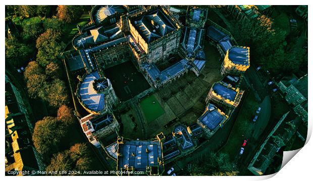 Aerial view of a historic Lancaster castle at sunset with surrounding greenery. Print by Man And Life