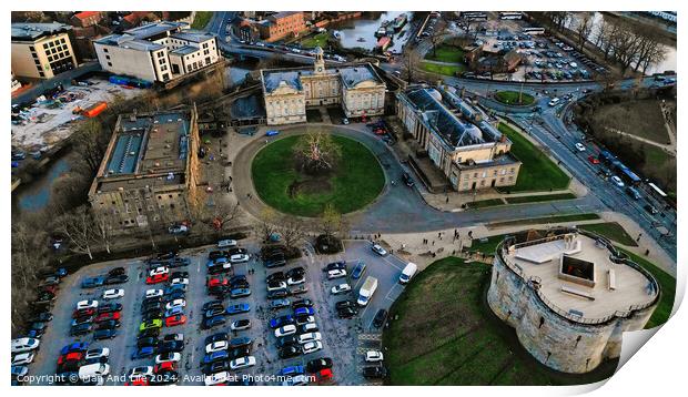 Aerial view of a historic city center with old buildings, a park, and a parking lot at dusk in York, North Yorkshire Print by Man And Life