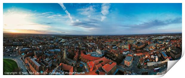 Panoramic aerial view of a cityscape at dusk with historic buildings and a dramatic sky in York, North Yorkshire Print by Man And Life