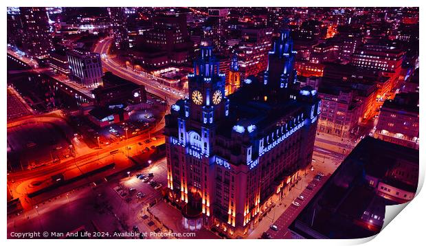 Aerial night view of an illuminated historic building amidst city streets with vibrant red traffic trails in Liverpool, UK. Print by Man And Life