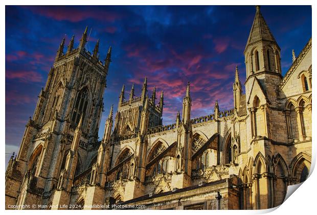 Majestic medieval cathedral against a vibrant sunset sky in York, UK. Print by Man And Life