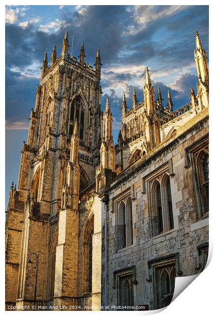 Gothic cathedral against a dramatic sky at sunset, showcasing intricate architecture and historical grandeur in York, UK. Print by Man And Life