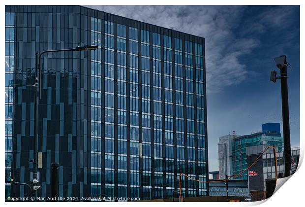 Modern glass office buildings with reflections under blue sky in Leeds, UK. Print by Man And Life