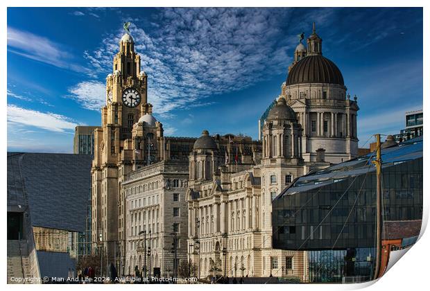 Liverpool's iconic waterfront buildings under a blue sky with wispy clouds. Print by Man And Life