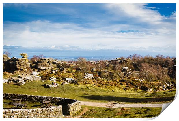 Scenic landscape with rocky formations, greenery, and a clear sky, ideal for travel and nature themes at Brimham Rocks, in North Yorkshire Print by Man And Life