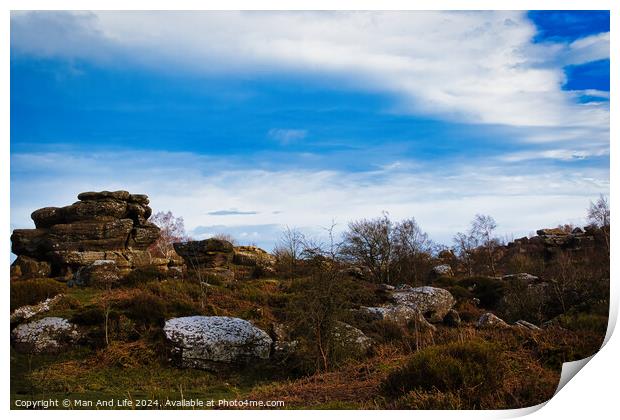 Scenic view of rock formations under a dramatic blue sky with clouds at Brimham Rocks, in North Yorkshire Print by Man And Life