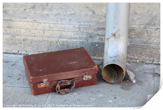 Old cardboard suitcase in the street Print by PhotoStock Israel