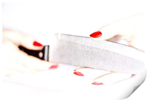 High-key female hand trying the sharpness of knife Print by Gabor Pozsgai