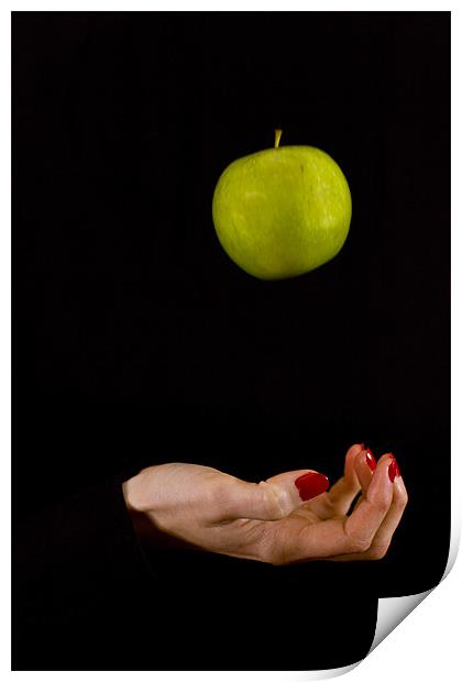 Female hand throwing a green apple Print by Gabor Pozsgai