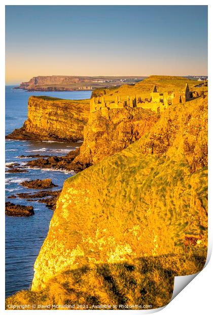 Majestic Dunluce Castle in the Golden Hour Print by David McFarland