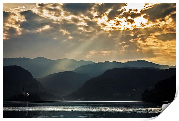 Angel rays over Lake Bled Print by Ian Middleton