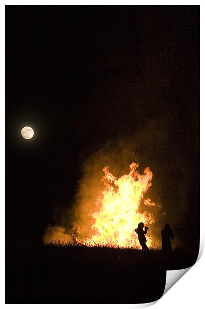 Bonfire on hill in Prezganje, Slovenia Print by Ian Middleton