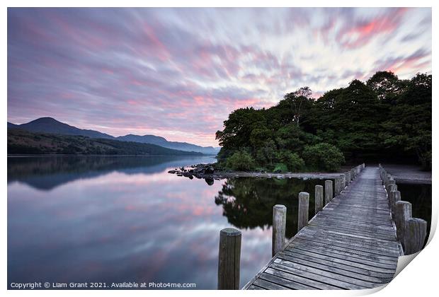 Jetty and reflections on the surface of Coniston Water at dawn. Print by Liam Grant