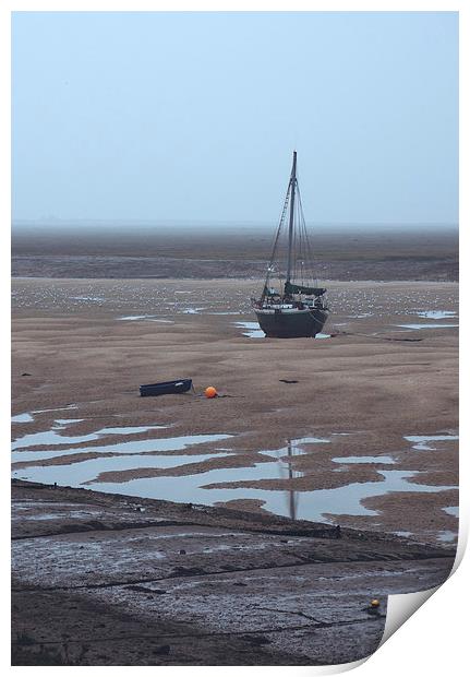 Boat at low tide on a foggy evening. Wells-next-th Print by Liam Grant
