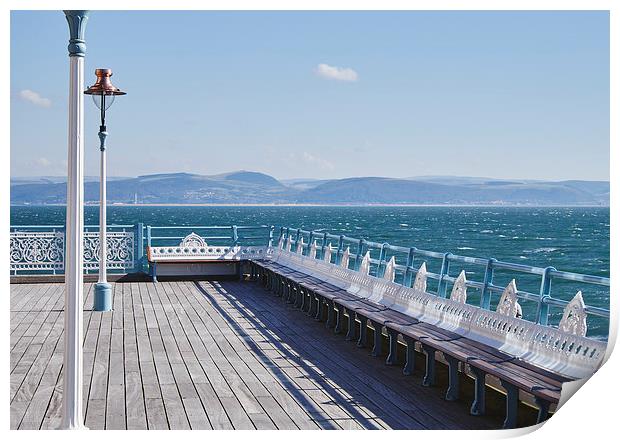 Lamp and seating on Mumbles Pier. Wales, UK. Print by Liam Grant