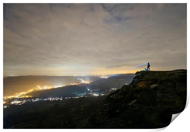 Male and his dog, standing on Curbar Edge at night Print by Liam Grant