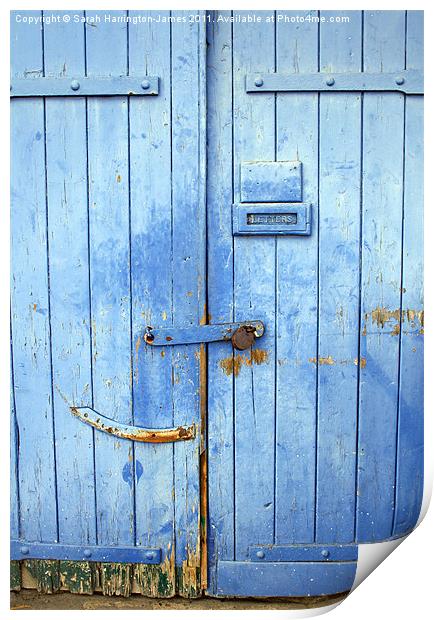 Old warehouse door at Ramsgate marina Print by Sarah Harrington-James