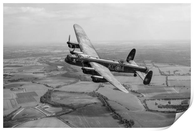 Lincolnshires Lancaster Bomber  Print by J Biggadike