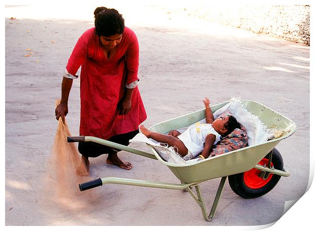  Mother keeps child in a wheel burrow while cleani Print by Hassan Najmy