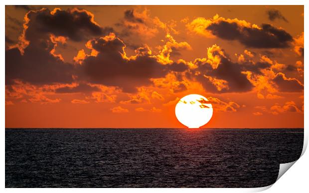 The sun touches the sea Print by Hassan Najmy