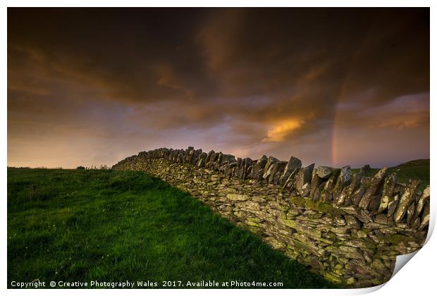 A stone wall and rainbow Print by Creative Photography Wales