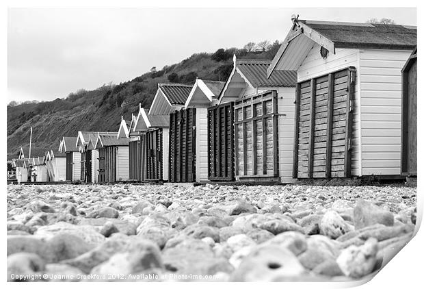 Huts at Lyme bay Print by Joanne Crockford