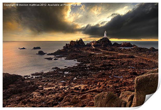 moody at La Corbiere lighthouse Print by meirion matthias