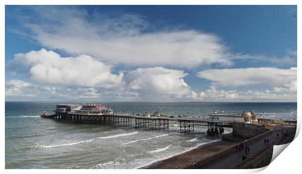 Cromer Pier with lifeboat sun and clouds Print by mark humpage