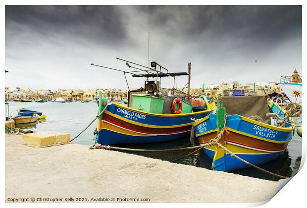 Moored in marsaxlokk bay Print by Christopher Kelly