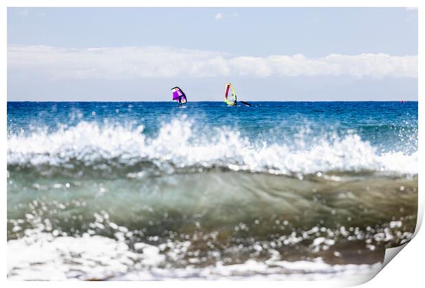Windsurfers windsurfing on blue seas at El Medano Tenerife Print by Phil Crean