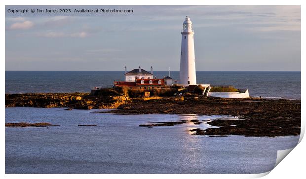 St Mary's Island and Lighthouse caught in a shaft of sunlight. Print by Jim Jones