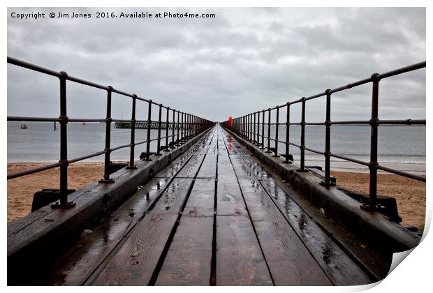 Wet wooden pier Print by Jim Jones