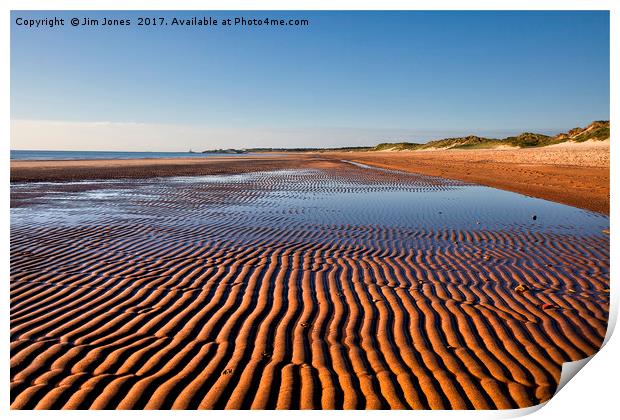 Ripples under a blue sky Print by Jim Jones