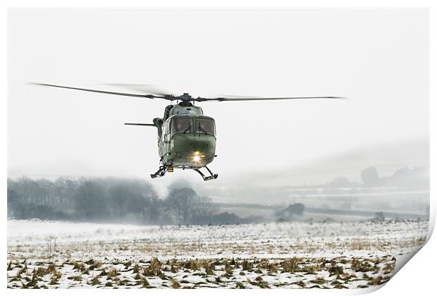 Army Lynx in the snow Print by Ian Jones