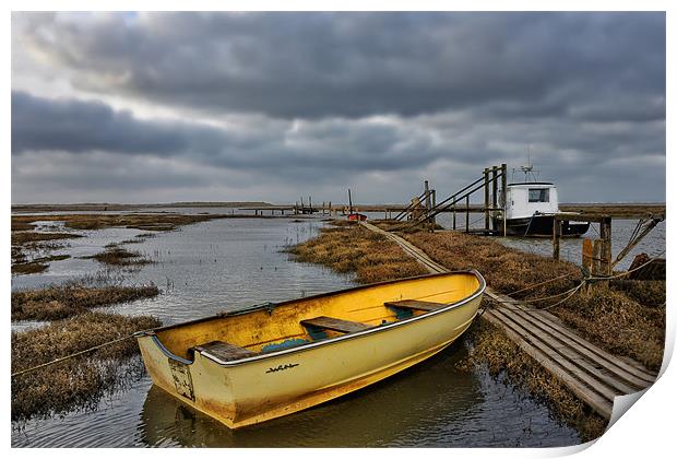 Yellow rowing boat Thornham quay Print by Gary Pearson